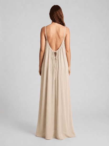 La robe dos nu qui fait tourner les têtes…